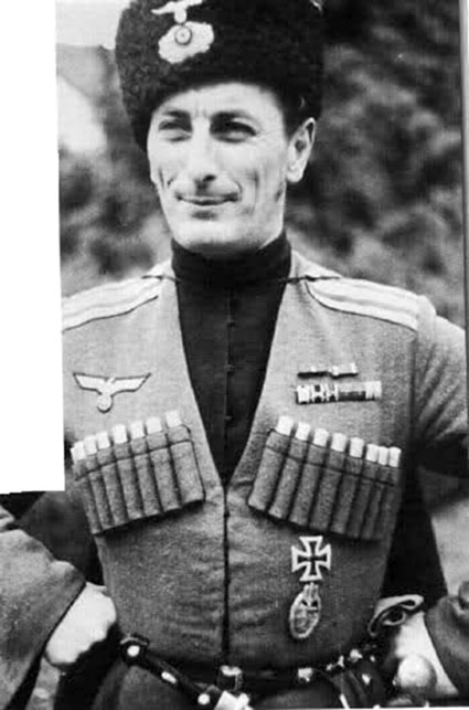 Kasakka saksalaisilla tunnuksilla. Palkittu rautaristill� ja haavoittumismerkill�.