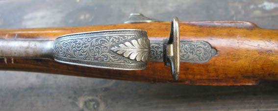 Kaiverrettu liipasinkaari.